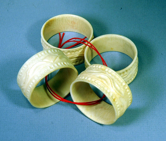 Set of 4 antique bone napkin rings