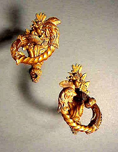Superb pair of French bronze dore jamb hooks.
