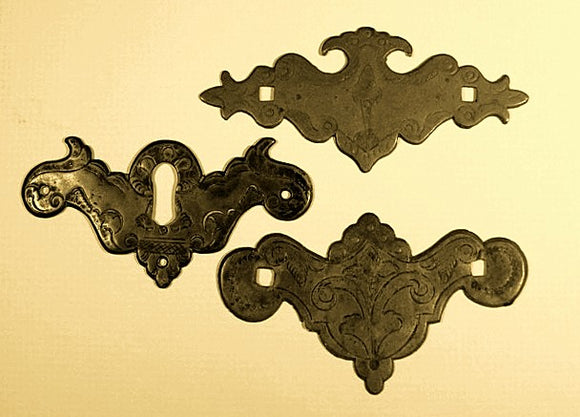 Three antique furniture brasses