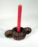 Unusual folk art candleholder made of bottle caps!