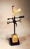 Vintage cast metal miniature weathervane on stand