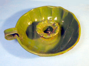 Vintage enamelled green candlestick holder