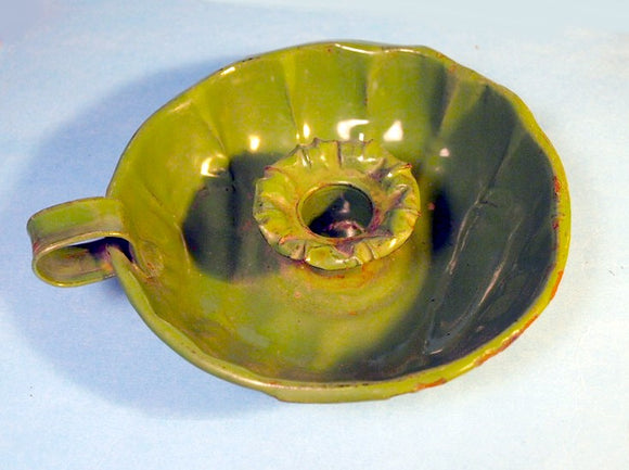 Vintage enamelled green candlestick holder