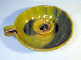 Vintage enamelled green candlestick holder