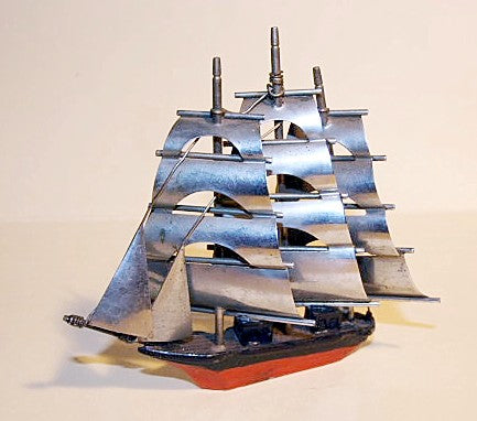 Vintage painted metal miniature ship