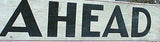 Vintage painted sign with enigmatic JUST AHEAD